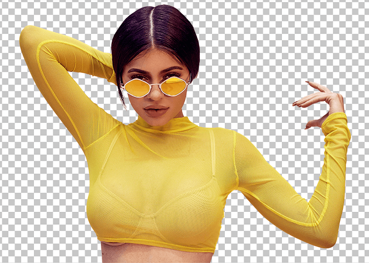 Kylie Jenner wearing yellow sunglasses and yellow top transparent image