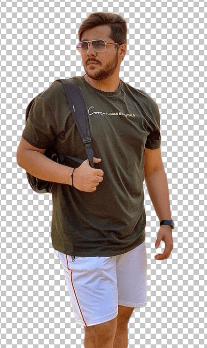 Ashish Chanchlani walking wearing white shorts holding a black bag transparent image