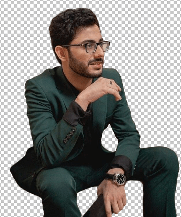 Carry Minati sitting while wearing a green suit transparent image