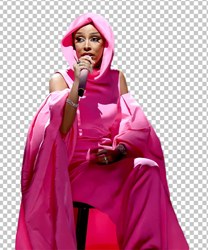 Doja cat in pink dress, sitting in chair and holding mike png image