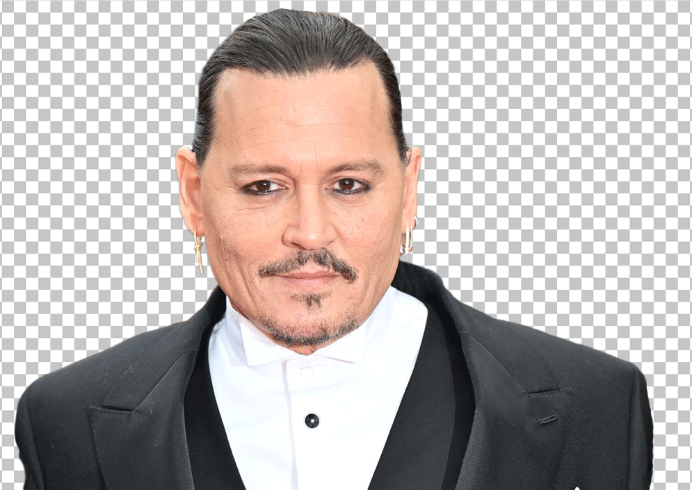 Johnny Depp wearing a black tuxedo and a white shirt.