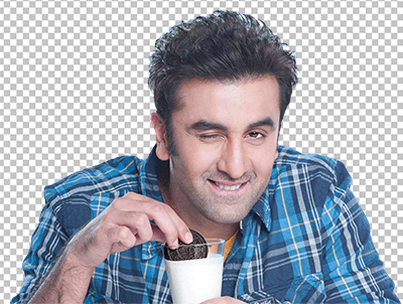Ranbir Kapoor wink and sitting at a table eating a cup of coffee png image