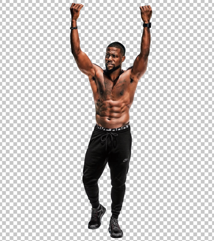 Kevin hart standing shirtless with his arms raised in the air.