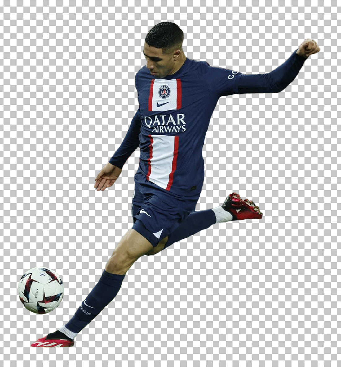 Achraf Hakimi shooting the ball and wearing PSG jersey.
