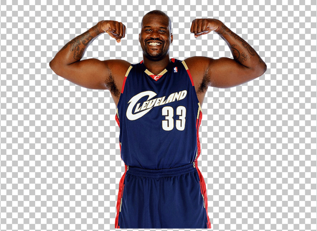 Shaquille O'Neal in a blue jersey with his arms flexed and his fists clenched.
