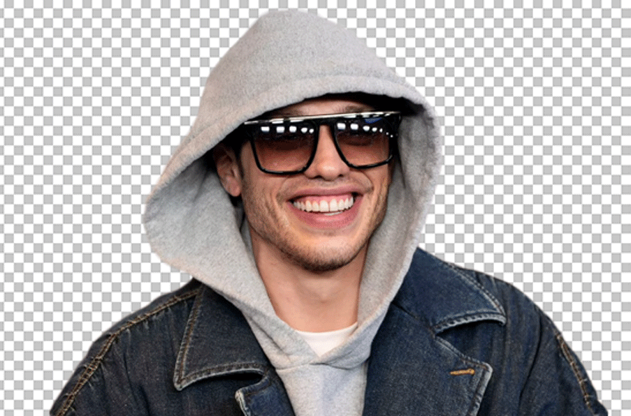 Pete Davidson is wearing a hoodie and sunglasses, smiling PNG Image.