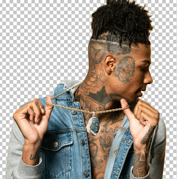 Blueface with tattoos on his neck and chest, wearing a denim jacket and a chain around his neck PNG Image
