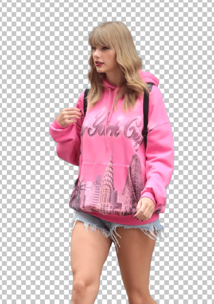 Taylor Swift in pink hoodie and shorts walking down PNG Image.