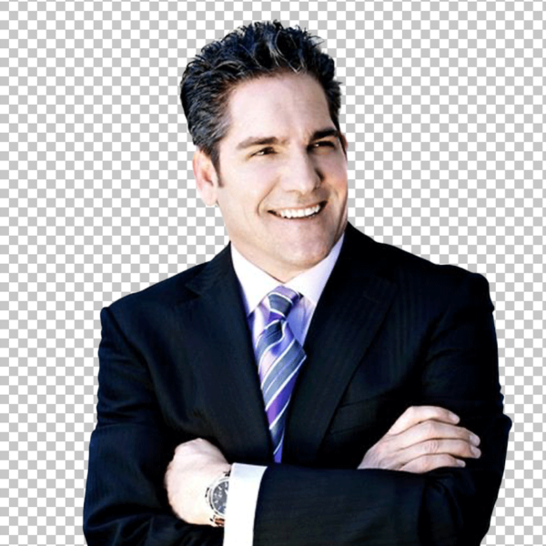 A PNG image of Grant Cardone, a man in a suit and tie, smiling and folding his hands.