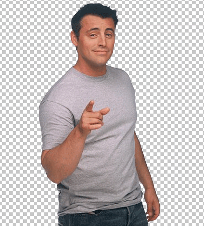 Joey Tribbiani in a gray t - shirt pointing at something with his finger.