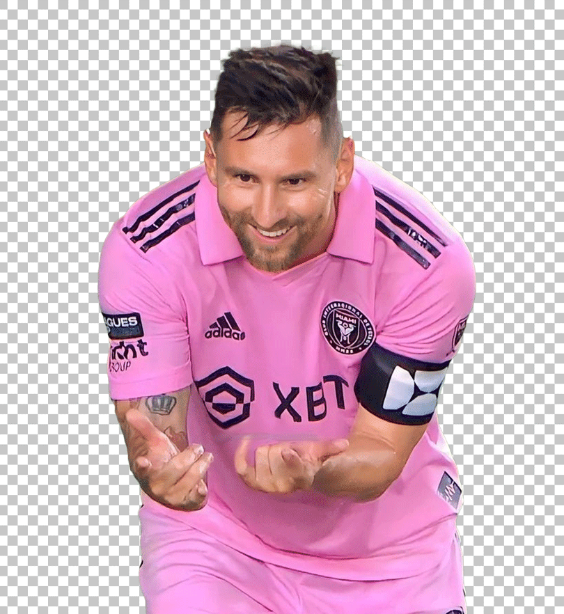 Messi, in a pink Inter Miami CF jersey, celebrates with his hands up, mimicking a spiderweb shot during a soccer match.