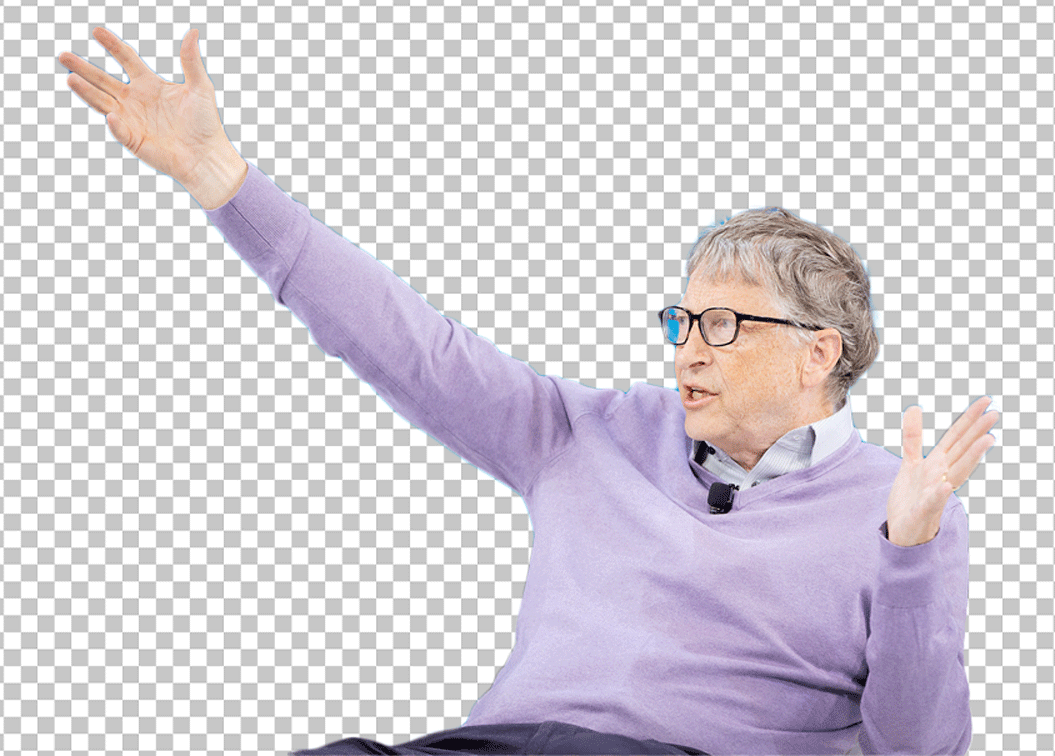 Bill Gates speaking and sitting in a chair with his arms raised in the air.
