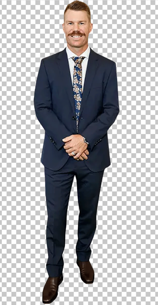 David Warner in suit and tie, standing PNG Image