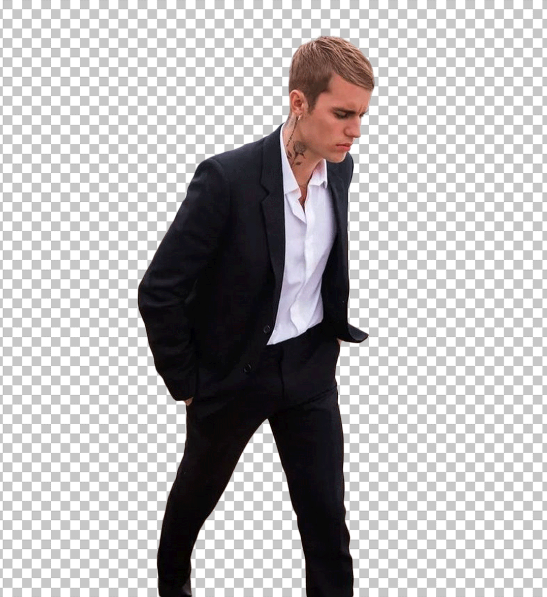 Justin Bieber is walking in a black suit PNG Image