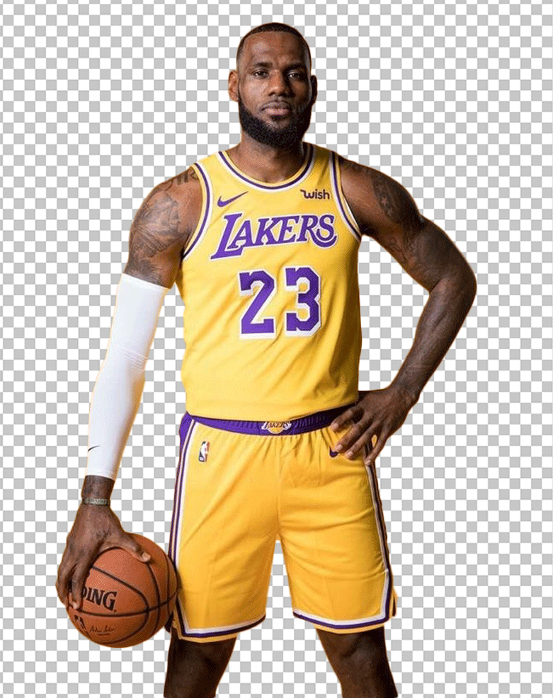 LeBron James standing in a yellow Lakers jersey and holding a basketball.