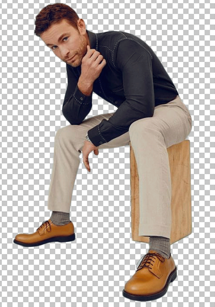 Chace Crawford sitting on a wooden box PNG Image