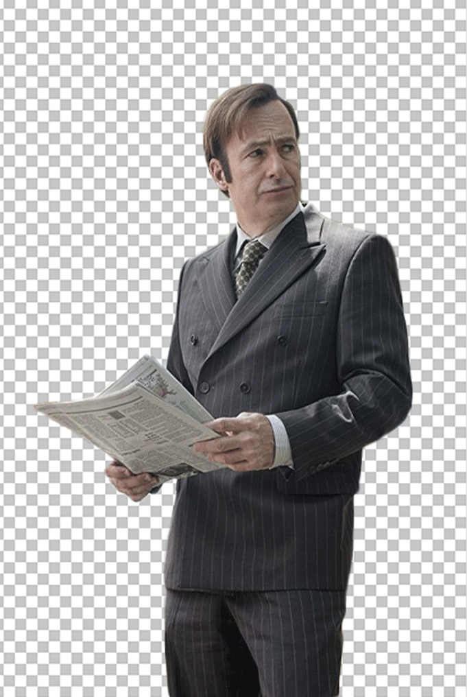 Saul Goodman was in a suit and tie, holding a newspaper in his hand.