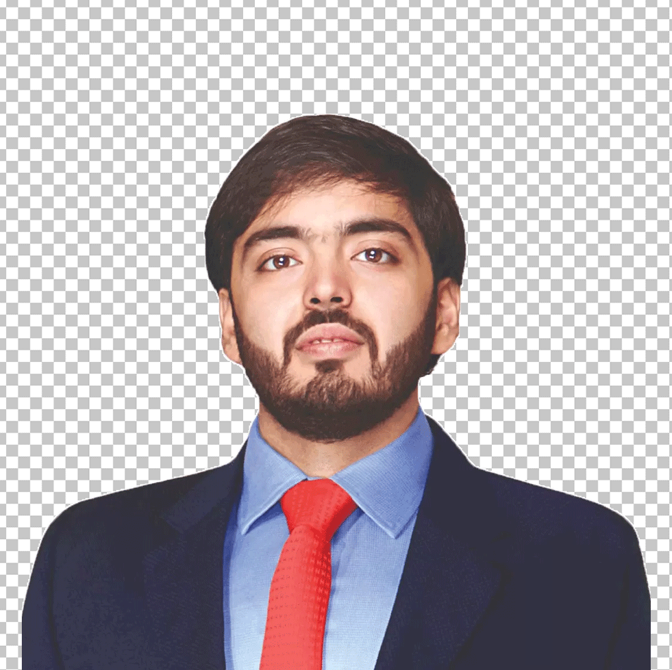 Anant Ambani is wearing a blue suit and a red tie.