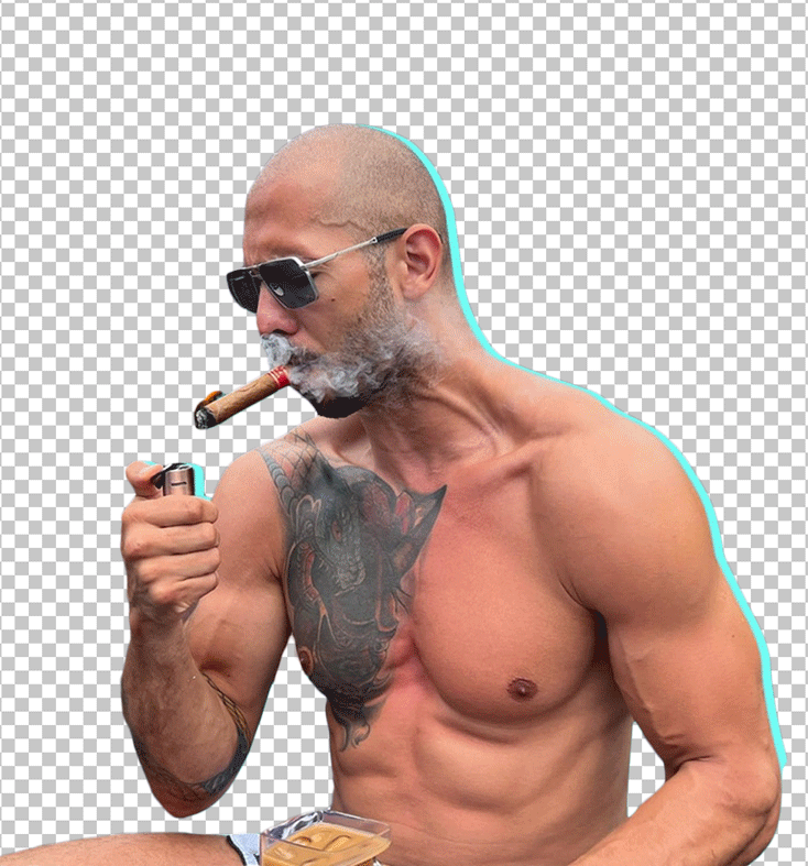 A shirtless, muscular Andrew Tate with tattoos is lighting a cigar.