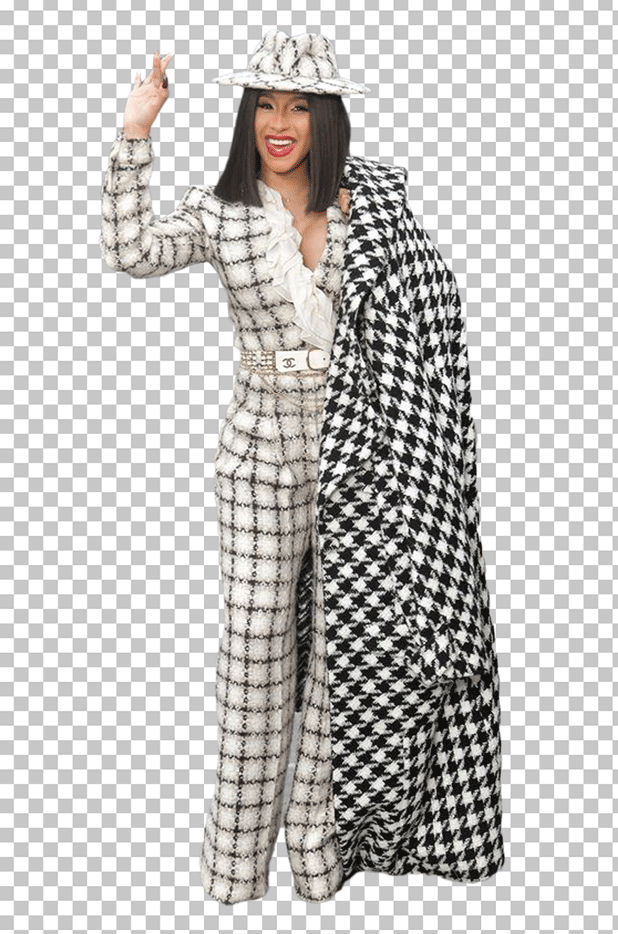 Cardi B is waving in a black and white checkered suit with a black hat and gloves.