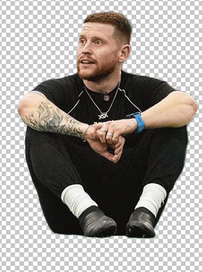 Ethan Payne is sitting on the ground PNG Image
