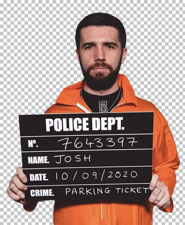 Mugshot of Josh Zerker holding a sign with the police department written on it.