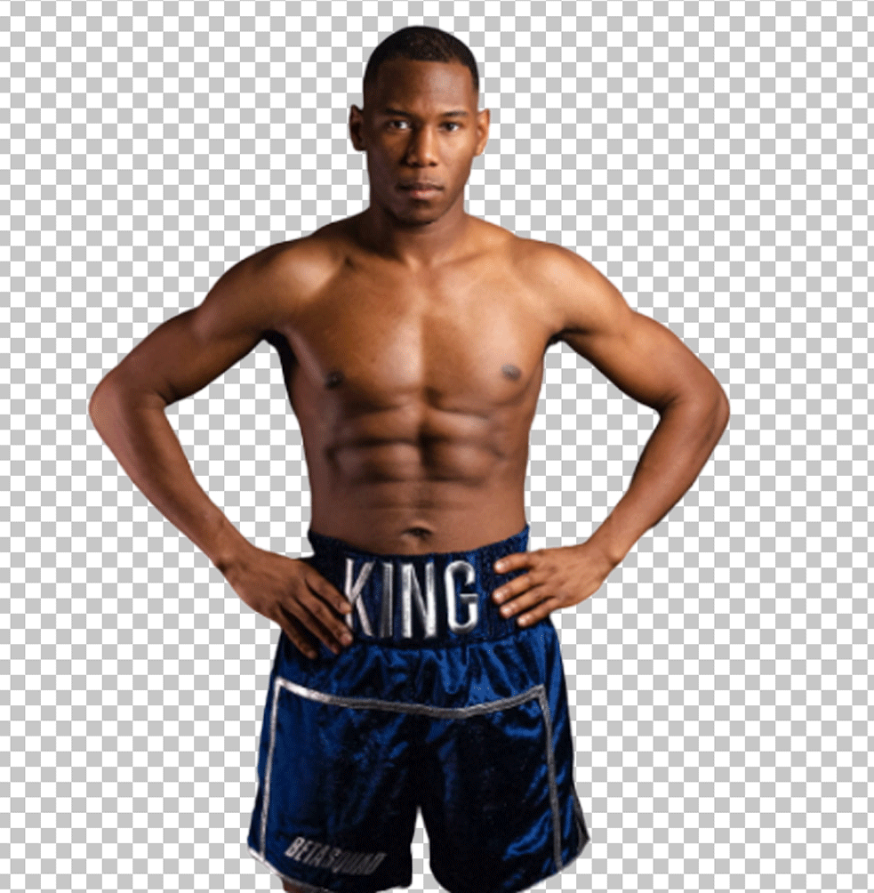 In a PNG image, King Kenny is standing wearing blue shorts.
